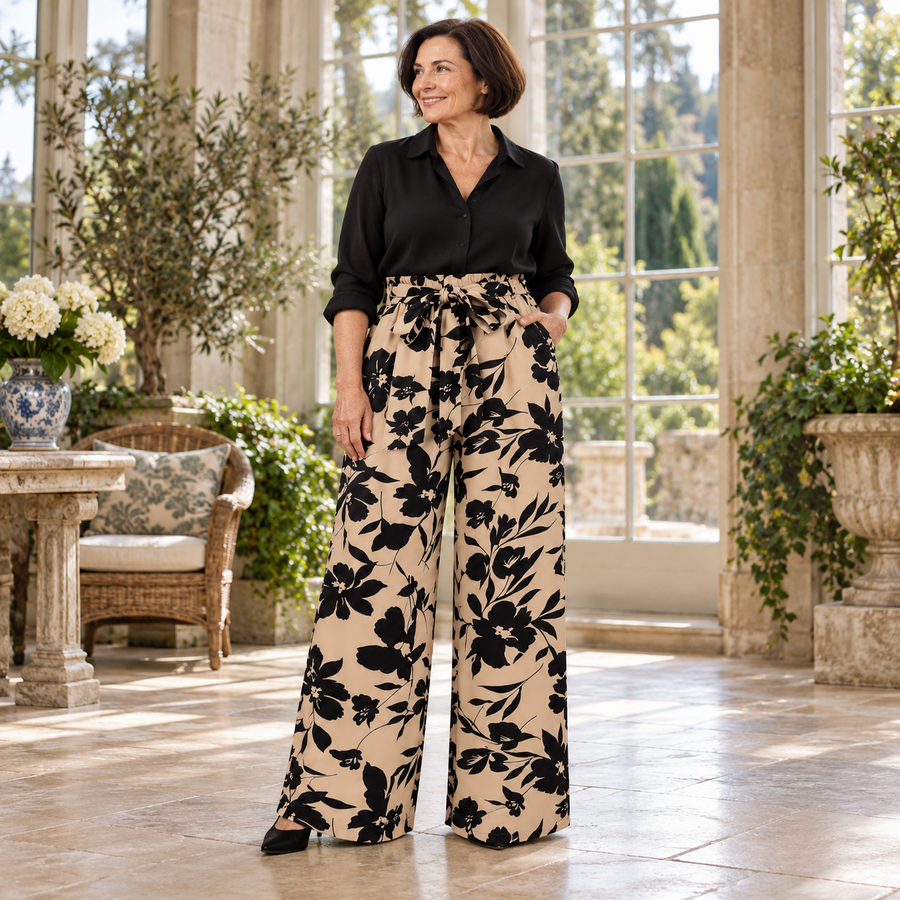Aoife Floral Wide-Leg Trousers on a mature model in an Irish editorial setting