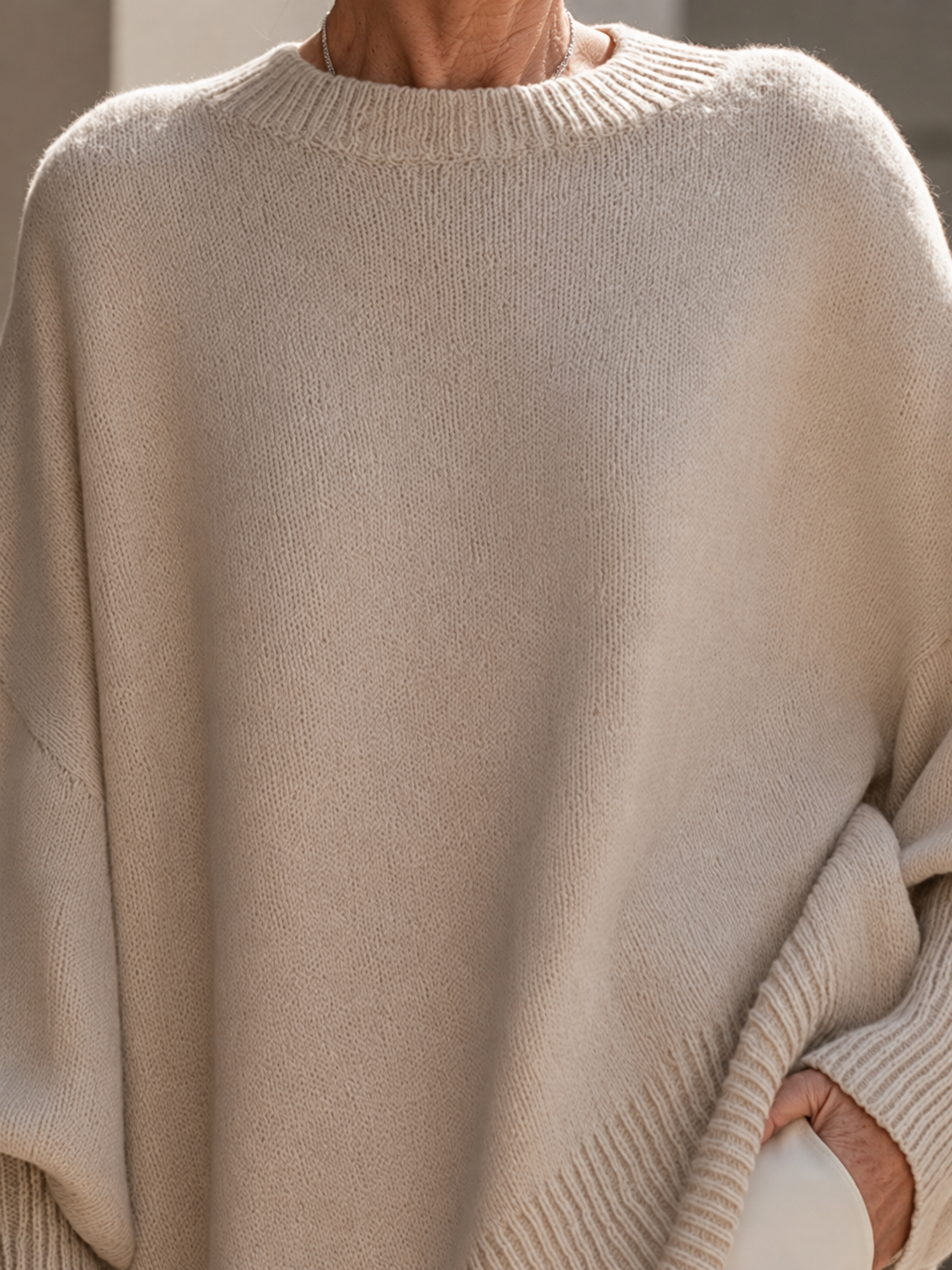 Shannon Relaxed Knit Jumper on a mature woman; AI-edited model